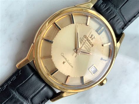 omega constellation 18k white gold.